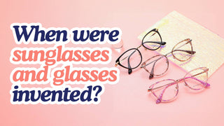 A collection of stylish modern glasses displayed on a soft pink background with the text "When were sunglasses and glasses invented?" inviting readers to explore the history of vision correction and eye protection.