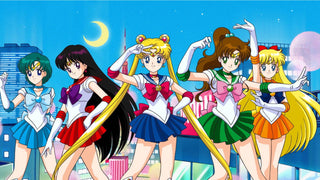 Five Sailor Scouts pose in blue, red, green, and orange sailor scouts colors against a night skyline.