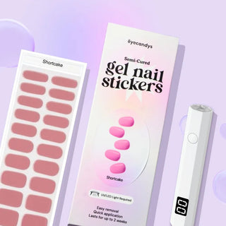 EyeCandys Shortcake Gel Nail Stickers in a soft pink shade, paired with a UV lamp for salon-quality gel nails, easy DIY nail art, and long-lasting nail wraps.