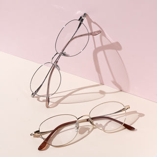 Eyecandys Zephyr Titanium Oval Full Frame Glasses for Unisex, offering a lightweight, durable frame with a modern oval shape. Perfect for those seeking high-quality, fashion-forward eyewear