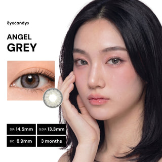 A woman with straight black hair wears Pink Label Angel Grey contact lenses by EyeCandys. An inset shows a close-up of the circle lenses. Text displays: Pink Label Angel Grey, DIA 14.5mm, G.DIA 13.3mm, B.C. 8.9mm, 3 months, EyeCandys.