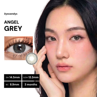 Female model wearing EyeCandys Pink Label Angel Grey contact lenses with soft grey gradient for a mesmerising, doll-eye effect