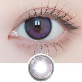 Close-up shot of model's eye adorned with Ann365 Anreen Pink Violet daily color contact lenses with prescription, paired with clean-girl eye makeup, showing the brightening and enlarging effect of the circle contact lens on dark brown eyes, above a cutout of the contact lens with limbal ring on a white background.
