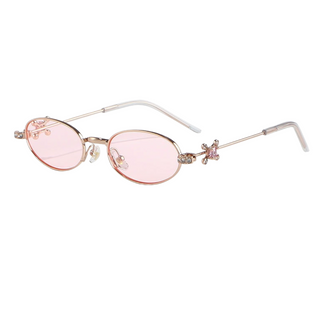 Eyecandys Auden sunglasses in Rose Gold Pink with soft pink-tinted oval lenses, delicate rose gold metal frame, and crystal-embellished temples – perfect for Y2K fashion, light UV protection, and prescription customization.