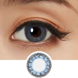 Collage showing Close-up shot of a model eye wearing Lacelle Colors Majestic Blue colored contact lens in one eye that is naturally dark-brown with natural eye make up and lashes, Single Lacelle Colors Majestic Blue contact lens on a white surface showing the pixel detail