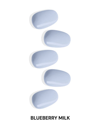 Close-up of EyeCandys Blueberry Milk Gel Nail Stickers in a delicate pastel blue design. Perfect for creating beautiful, long-lasting nails with a 7-free, allergy-friendly formula. Cures in sunlight, lasting 2-3 weeks without the need for a UV lamp.