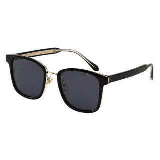 side view of Bon Black Gold sunglasses from EyeCandys on a white background, featuring a sophisticated design with black and gold accents perfect for a modern, elegant style.