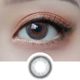 Close-up of eye wearing EyeCandys Bubble Blue color contact lens with lens design below – bright blue design for a striking eye look. Available in prescription colored contact lenses and color contact lenses