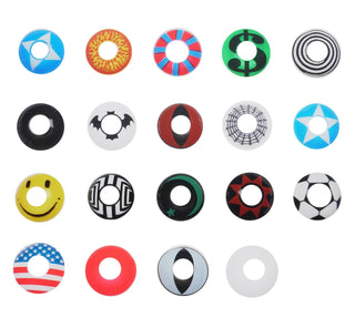 Various colorful cosplay contacts or halloween contact lenses on a white background