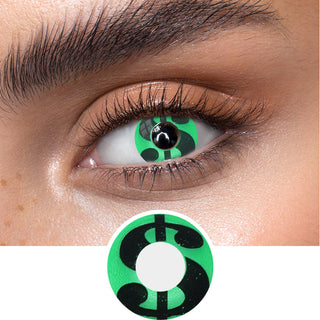 Green money sign contact lenses on an dark eye, showing the opacity and vividness of the Halloween contact lens, above a cutout of the green contact lens pattern