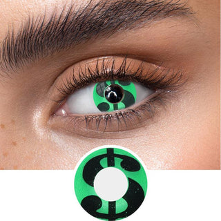 Green money sign contact lenses on an dark eye, showing the opacity and vividness of the Halloween contact lens, above a cutout of the green contact lens pattern