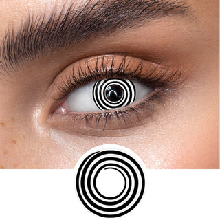 White black swirl colored contact lenses on an dark eye, showing the opacity and vividness of the Halloween contact lens, above a cutout of the white and black contact lens pattern