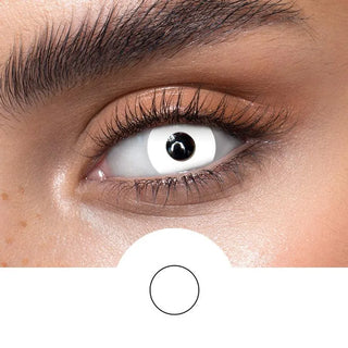 White contact lenses on an dark eye, showing the opacity and vividness of the Halloween contact lens, above a cutout of the contact lens pattern