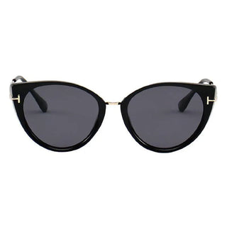 Cyprus Cat Eye Sunglasses by Eyecandys in Black Gold color. Stylish black cat eye sunglasses with elegant gold trim. Rx on the bottom