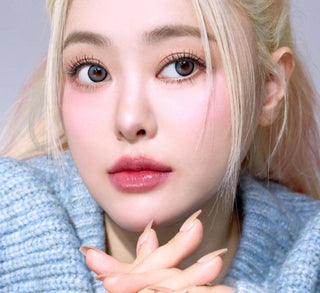 Model showcasing the natural look using i-Sha Dekame Hug Me Grey prescription colored contact lenses, above a closeup of a pair of eyes enhanced and widened by the circle lenses.