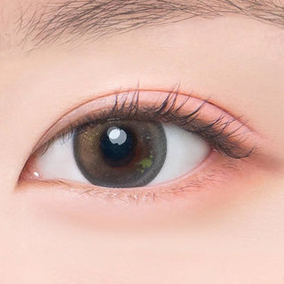 Macro shot of an eye wearing the DooNoon Jinju Beads 1-Day Grey (10pk) prescription colour contact lens, showing the multi-colored detail and natural effect on dark brown eyes.