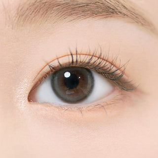 Close-up view of the i-DOL Eyeis Essential Grey coloured contact lenses on a woman's eye