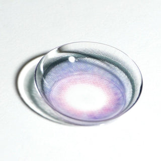 Macro shot of EyeCandys Powerglow Violet contact lens — bold violet color with ultra-vibrant pigmentation, thin limbal ring for enhanced iris definition, UV protection, moisture-locking MPC polymer, and antifouling technology for all-day comfort. Perfect for cosplay looks