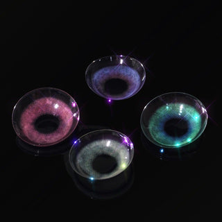 Close-up macro shot of EyeCandys Powerglow Green, Red, Purple, and Grey colored contact lenses. High-quality prescription colored contact lenses in vibrant colors for bold eye transformation