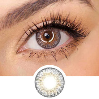Pink Label Fresh Look Grey color contact lens on top of a dark eye paired with subtle eye makeup and curled wispy eyelashes, above the contact lens design.