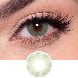 Detailed image of natural EyeCandys Glossy Green contact lens on a dark eye