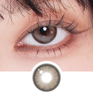 Close-up shot of model's eye adorned with Hugmoon Brown colored contacts in prescription, complemented by clean eye makeup, above a cutout of the brown contact lens itself showing the dense starburst pattern.