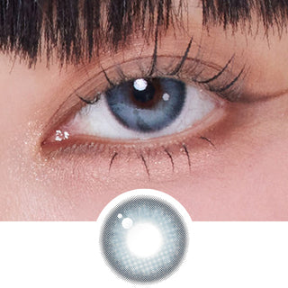Close-up shot of model's eye adorned with Hugmoon Blue colored contacts in prescription, complemented by clean eye makeup, above a cutout of the blue contact lens itself showing the dense starburst pattern.