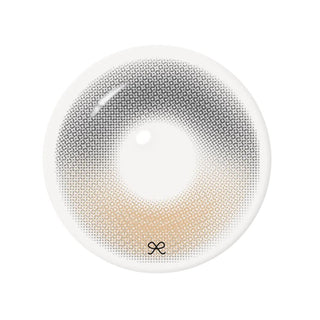 Close-up of patterned gray-brown contact lens with black rim.