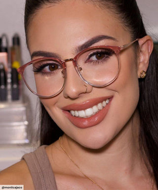 model with simple everyday make up look wearing Infinity Oversized Oval in rose crystal color