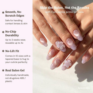 A hand displays EyeCandys Lilac Dew Press-On Nails—long, almond-shaped, pink nails with floral accents. Text highlights smooth edges, no-chip durability, secure fit, and real salon gel manicure finish.