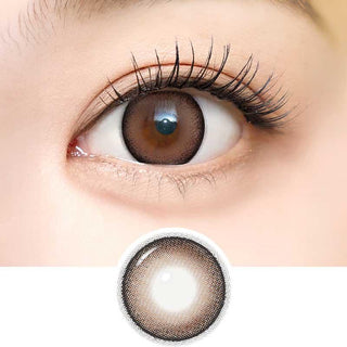 Detailed view of Dekame Look At Me Sand contact lens on a brown eye which also includes a close-up detail of the contact lens.