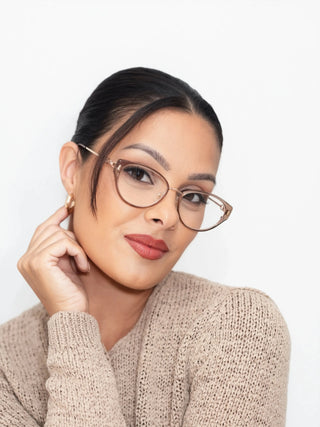 Marina wearing EyeCandys Bonbon Cat-Eye prescription glasses – chic blue light blocking eyewear with Zeiss HMC lenses, photochromic UV responsive transition technology, and polarized sunglasses option. Perfect anti-glare glasses for eye strain and screen time.