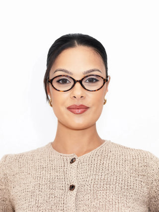 EyeCandys Chase Round Oval
prescription glasses on Marina with Zeiss HMC lenses – perfect for digital eye strain, UV-responsive photochromic transitions, and polarized sunglasses functionality.
