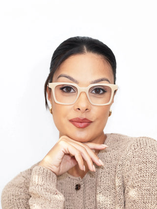Marina wearing EyeCandys Hotshot Square prescription glasses – classic square frames with blue light blocking lenses, Zeiss HMC anti-glare coating, UV-responsive photochromic transitions, and polarized sunglasses option. Best square eyeglasses for eye strain, work, and everyday style.