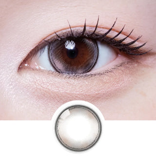 Close-up of eye with long lashes wearing EyeCandys Olola Meow Devon Beige prescription colored contact lens, with lens design shown below.