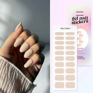 Hand with EyeCandys Moo-n Beam Gel Nail Sticker – easy 10-minute salon-quality manicure, lasts 2-3 weeks, 7-free allergy-friendly formula, cure with sunlight, minimalist and trendy spring summer nail design.