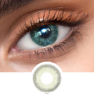 Close-up view of EyeCandys Sugarlook green contact lens on a model's dark eye, paired with natural eye makeup, above the graphic design of the green eye contacts.