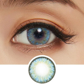A close-up of a person’s eye wearing NEO Vision Cosmo Blue lenses by NEO Vision, with an inset showing the coloured contact lens design on a white background.