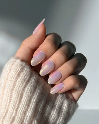 Hand with EyeCandys Pink Soda Pop Gel Nail Stickers featuring a vibrant pink glitter design. These semi-cured gel stickers offer a fun, sparkly manicure that lasts up to 2 weeks—perfect for bold, playful spring and summer nail looks with a glossy, salon-quality finish.