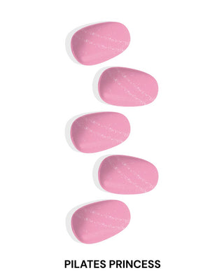 EyeCandys Pilates Princess Gel Nail Stickers in pink with glitter accents. Achieve effortless, trendy spring nails that last 2-3 weeks with a 7-free, allergy-friendly formula. Cures in sunlight, no UV lamp needed for a chic, long-lasting manicure.