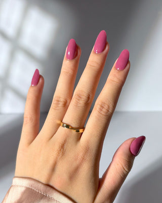 Model showcasing Raspberry Milk Eyecandys semi cured gel nail stickers