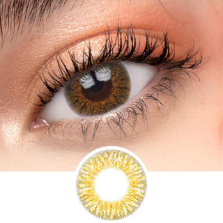 Close-up view of Pink Label New York Brown contact lens on a dark brown eye, paired with natural eye makeup, next to a cutout of the contact lens