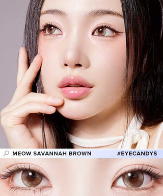 A female model with natural dark eyes wearing Olala Meow Savannah Brown contact lenses, complemented by subtle eyeshadow and peach lip gloss and Close-up image showcases the model's eyes adorned with the same brown contact lenses