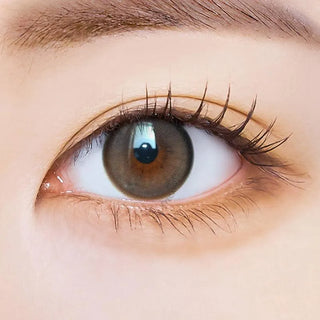 Macro shot of an eye wearing the i-Sha Oriana Fit Royal Grey prescription colour contact lens, showing the multi-colored detail and natural effect on dark brown eyes.