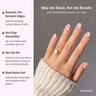 A hand models EyeCandys Pink Noise Press-On Nails—neatly manicured, natural look with smooth edges, no-chip durability, no-lift fit, and real salon gel shine. The wearer has a cream sweater and a ring.