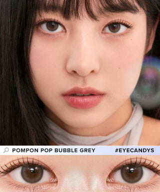 Beautiful female Asian model wearing Eyecandys Chuu Pompon bubble grey contact lenses with natural make up. While a separate illustration a close-up image of grey contact lenses with a bubble-like pattern resembling pom poms on model's natural dark brown eyes. Natural eye make up with false lashes for natural and fresh look.