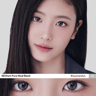 Model with natural makeup wearing EyeCandys NEOism Pure Mud Black prescription colored contact lenses - full face and close-up of eyes with long lashes, deep natural black color, comfortable daily wear, trending cosmetic lenses