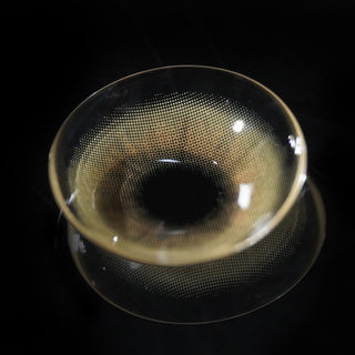 Macro shot of Eyecandys Cashmere Satin Olive prescription colored contact lens, showcasing detailed lens design, natural olive tones, and texture.