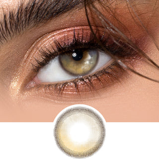 Close-up of EyeCandys Sunlit Hazel contact lens with label highlighting beautiful eyes