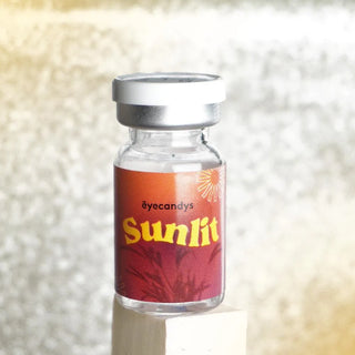 EyeCandys Sunlit Hazel contact lens glass vial packaging closeup